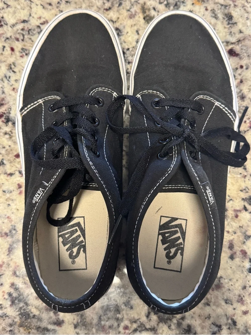 Vans Black Canvas Low-Top Sneakers with White Soles and Red Heel Tabs